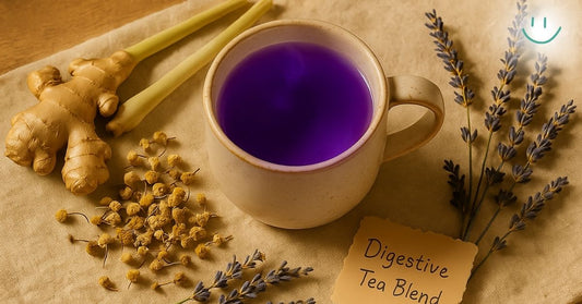 Warm mug of purple herbal tea labeled “Digestive Tea Blend,” surrounded by fresh ginger root, lemongrass, dried chamomile, and lavender sprigs on a natural beige cloth, evoking a calm, handmade, and holistic wellness vibe.